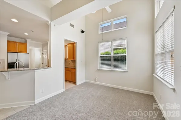 a view of a big room with carpet
