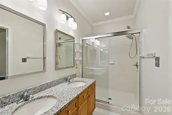 a view of a hallway with an entryway