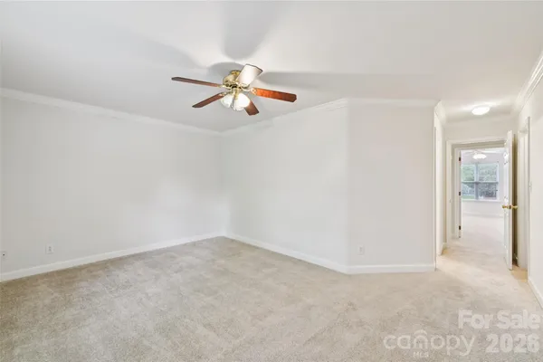 a view of a storage & utility room with dryer and washer