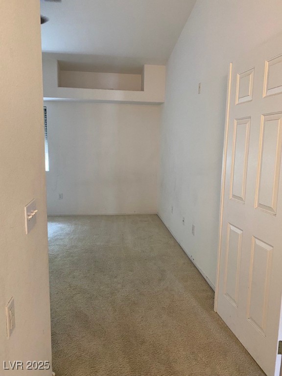 10525 Autumn Pine Avenue, Unit 205 Las Vegas, NV 89144 - Photo 7 of 8 Unfurnished room featuring carpet
