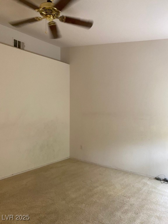 10525 Autumn Pine Avenue, Unit 205 Las Vegas, NV 89144 - Photo 8 of 8 Carpeted spare room with ceiling fan