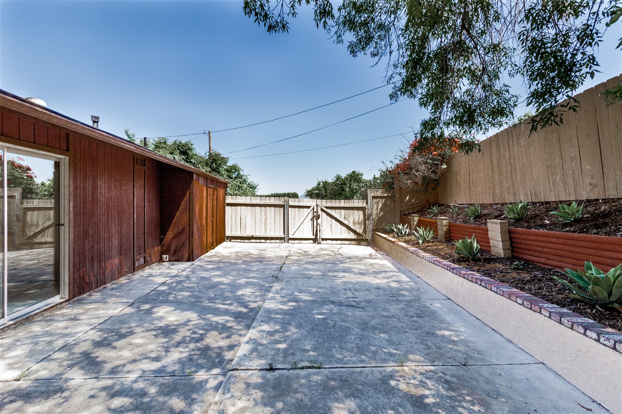 8533 Golden Ridge Road Lakeside, CA 92040 - Photo 1 of 18 2 car Garage parking and also this large space in the Back for RV or boat parking.