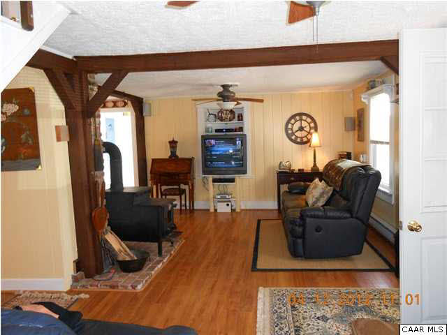 1714 Boxwood Farm Road Amherst, VA 24521 - Photo 7 of 10 a living room with furniture and a window