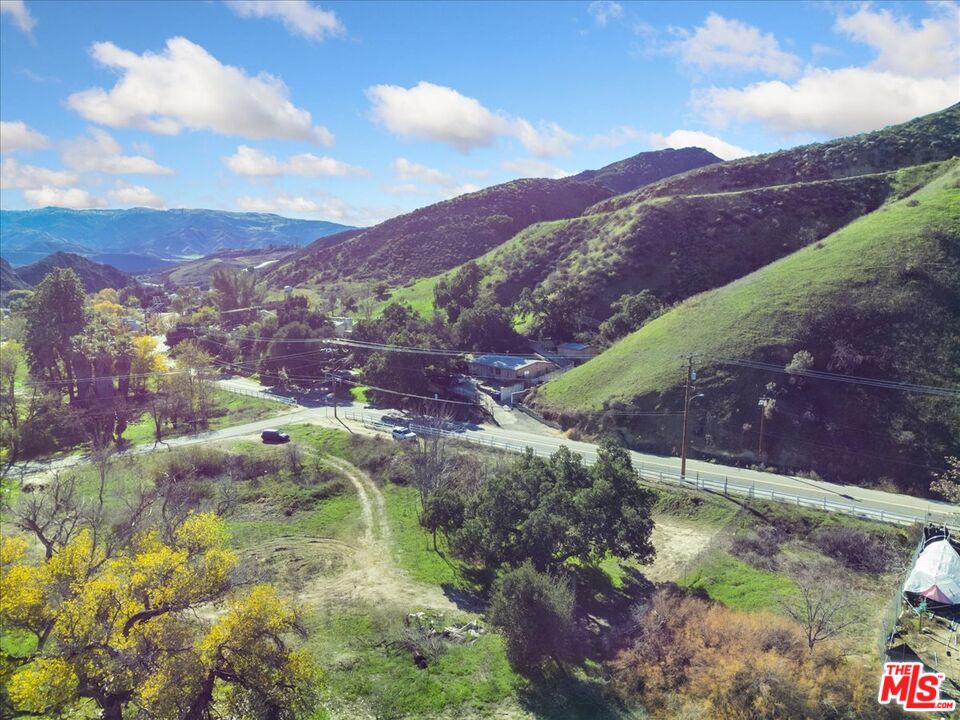 a view of a house with a mountain