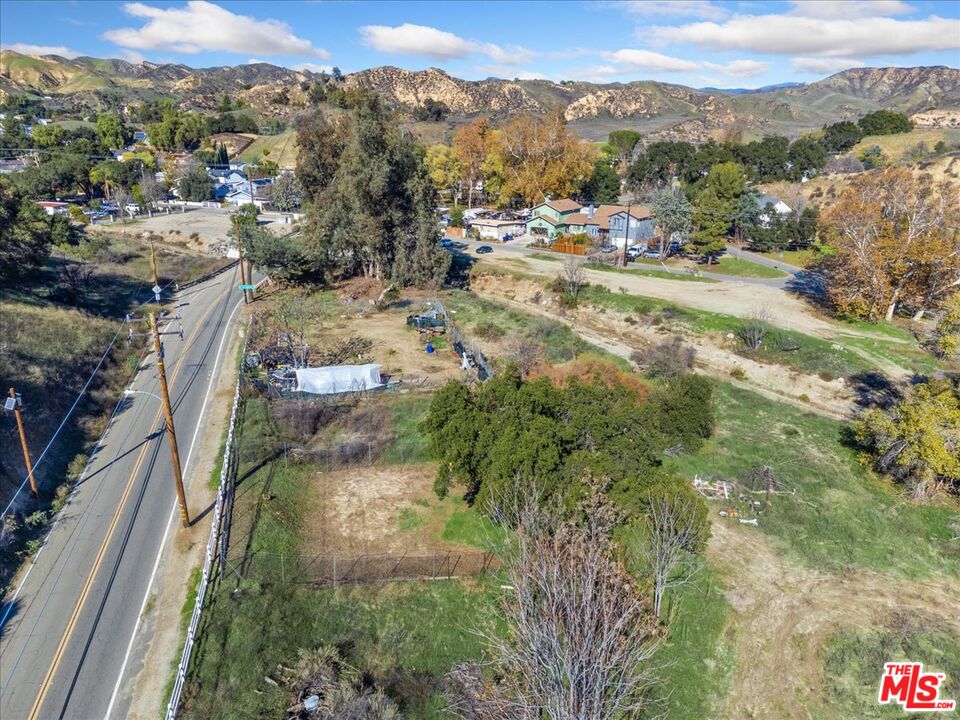 0 Johnson Avenue Val Verde, CA 91384 - Photo 11 of 11 a view of a lake with mountains in the background