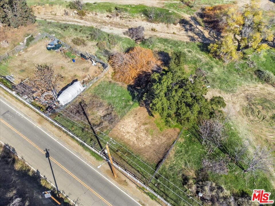 0 Johnson Avenue Val Verde, CA 91384 - Photo 8 of 11 a view of a yard with a wooden bridge