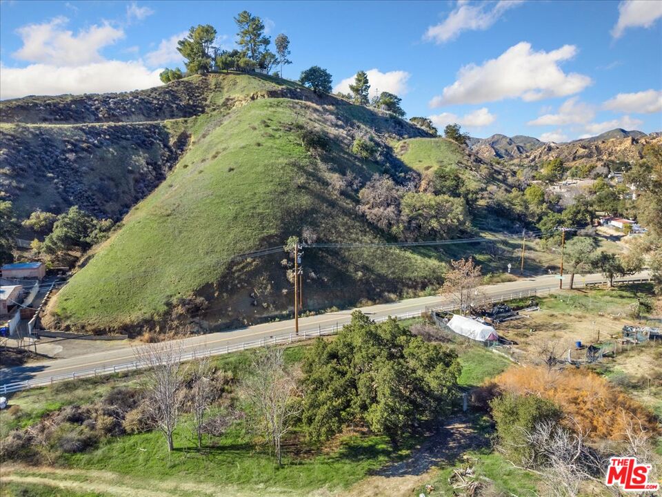 0 Johnson Avenue Val Verde, CA 91384 - Photo 10 of 11 a view of a yard with mountains