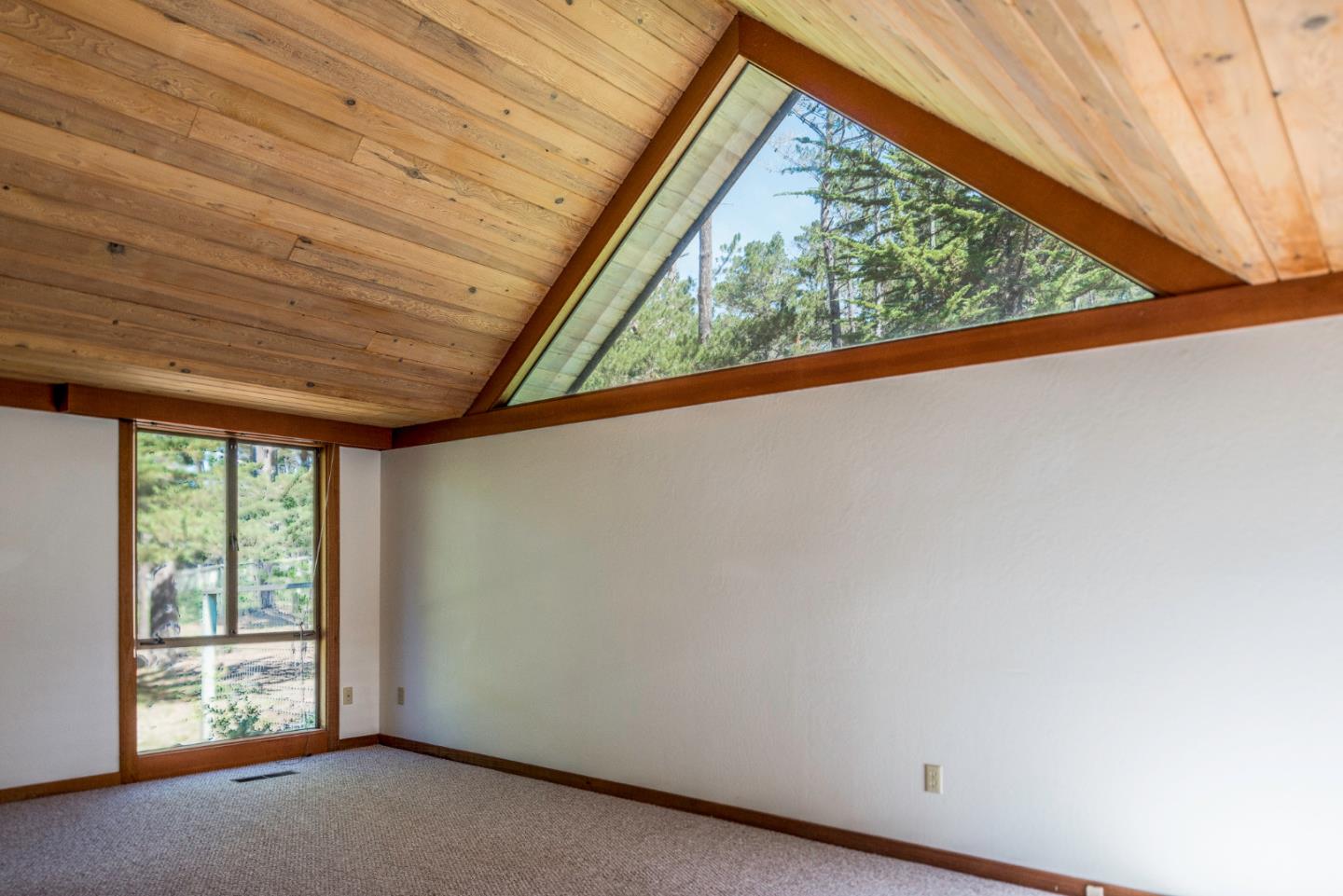 1280 Viscaino Road Pebble Beach, CA 93953 - Photo 14 of 48 a view of a room with a large window