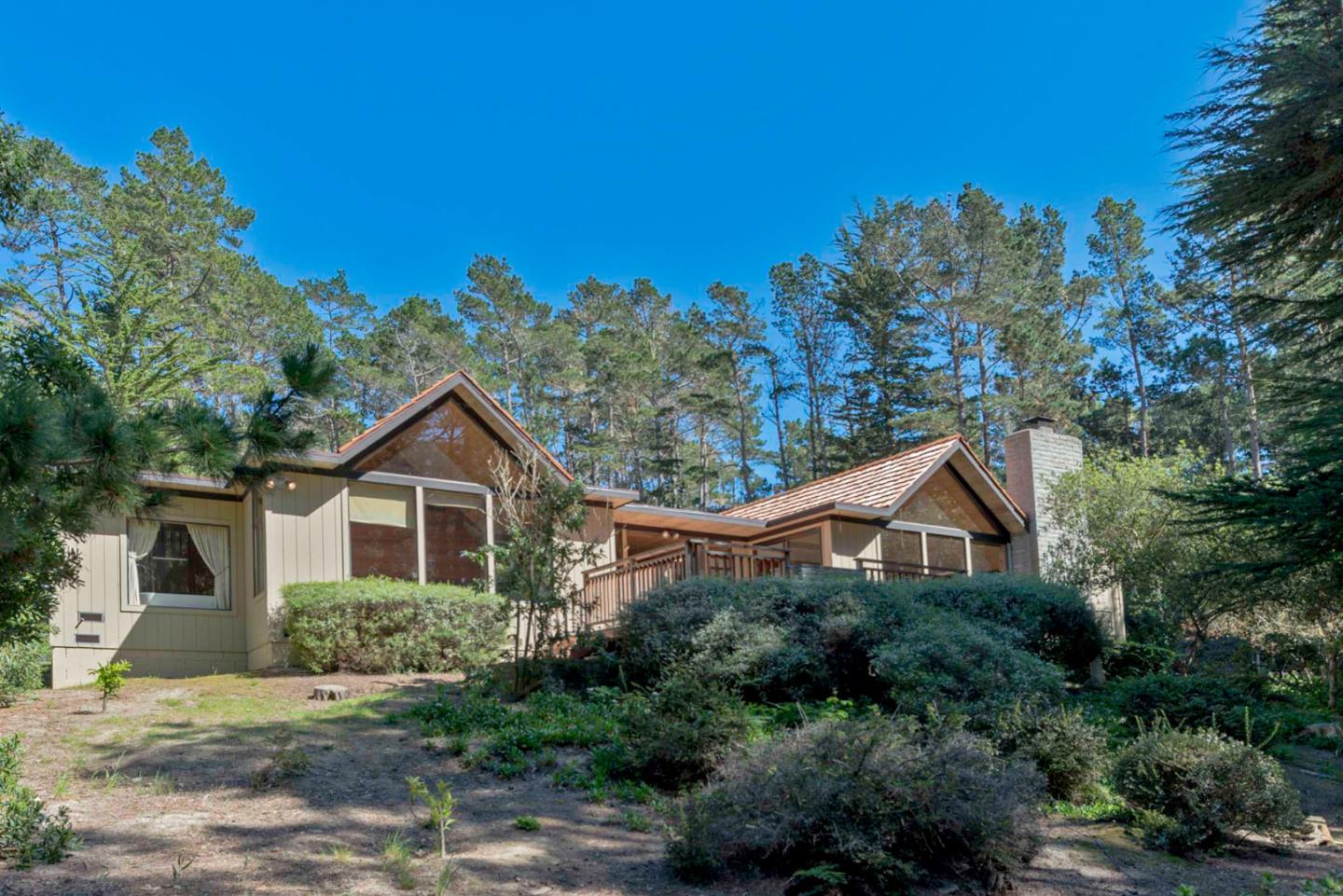 1280 Viscaino Road Pebble Beach, CA 93953 - Photo 2 of 48 a view of a house with a yard