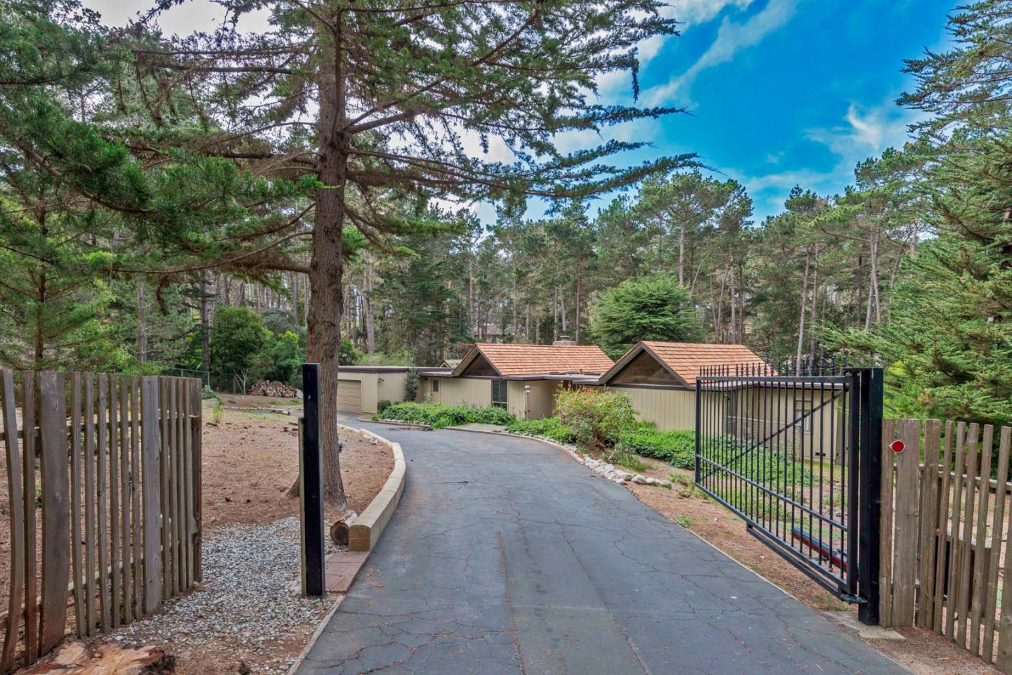 1280 Viscaino Road Pebble Beach, CA 93953 - Photo 31 of 48 a view of a park with large trees