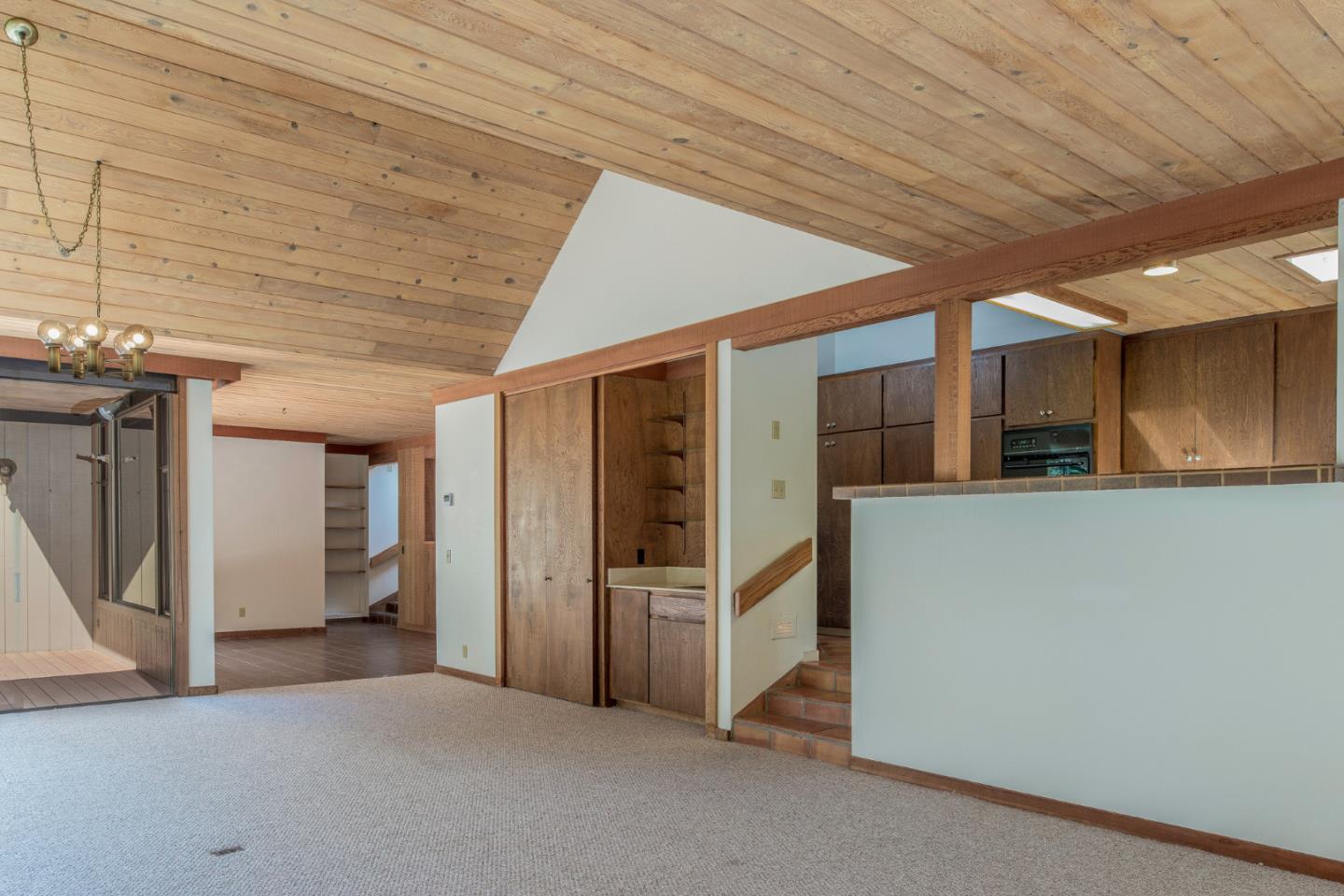 1280 Viscaino Road Pebble Beach, CA 93953 - Photo 34 of 48 a view of a hallway with staircase