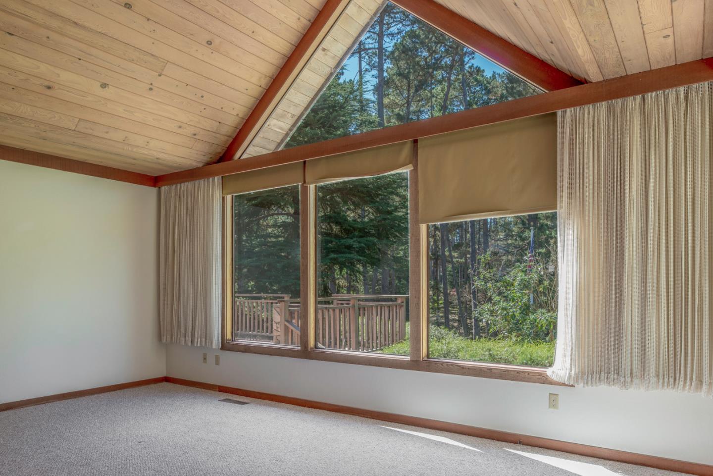 1280 Viscaino Road Pebble Beach, CA 93953 - Photo 41 of 48 a view of a room with a large window