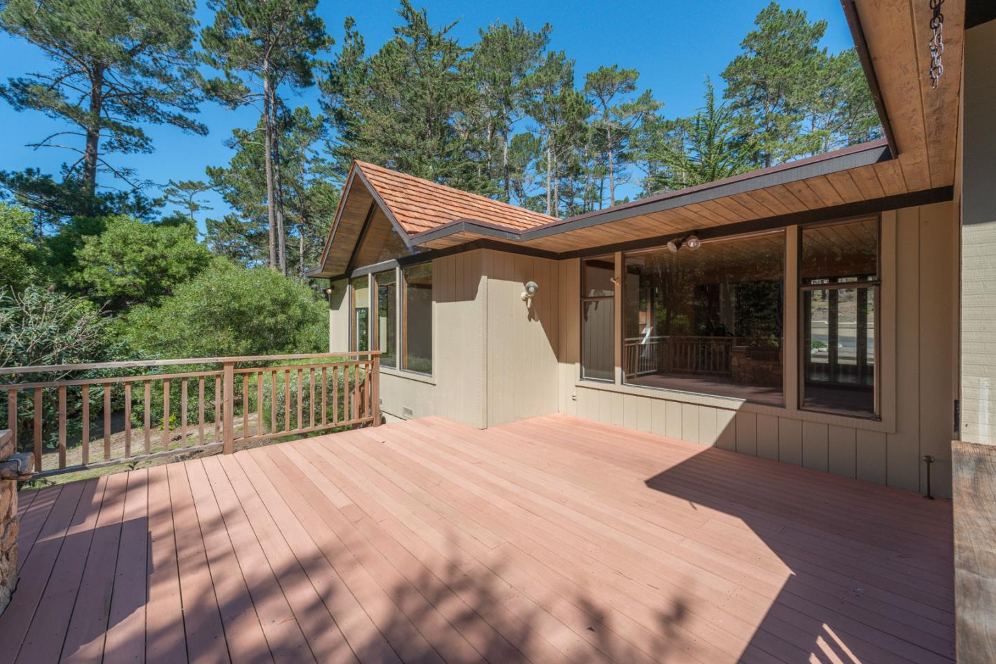 1280 Viscaino Road Pebble Beach, CA 93953 - Photo 5 of 48 a view of a house with a balcony