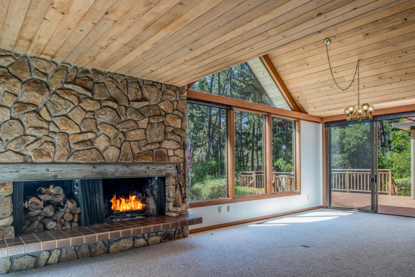 1280 Viscaino Road Pebble Beach, CA 93953 - Photo 7 of 48 a living room with furniture and a fireplace