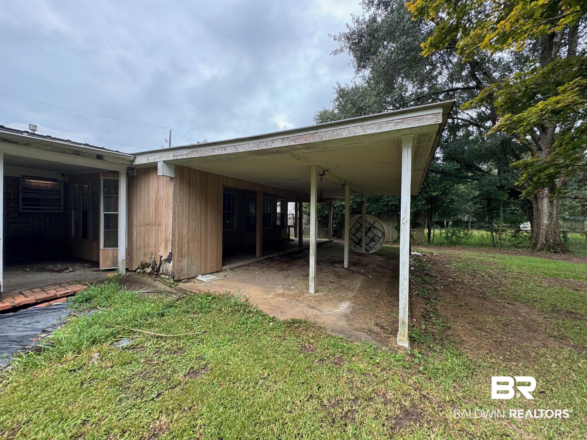 5198 Lancelot Drive Mobile, AL 36619 - Photo 28 of 30 View of car parking with an attached carport