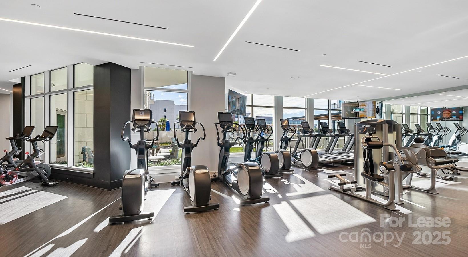 4425 Sharon Road, Unit 2F Charlotte, NC 28211 - Photo 11 of 44 a view of a room with gym equipment