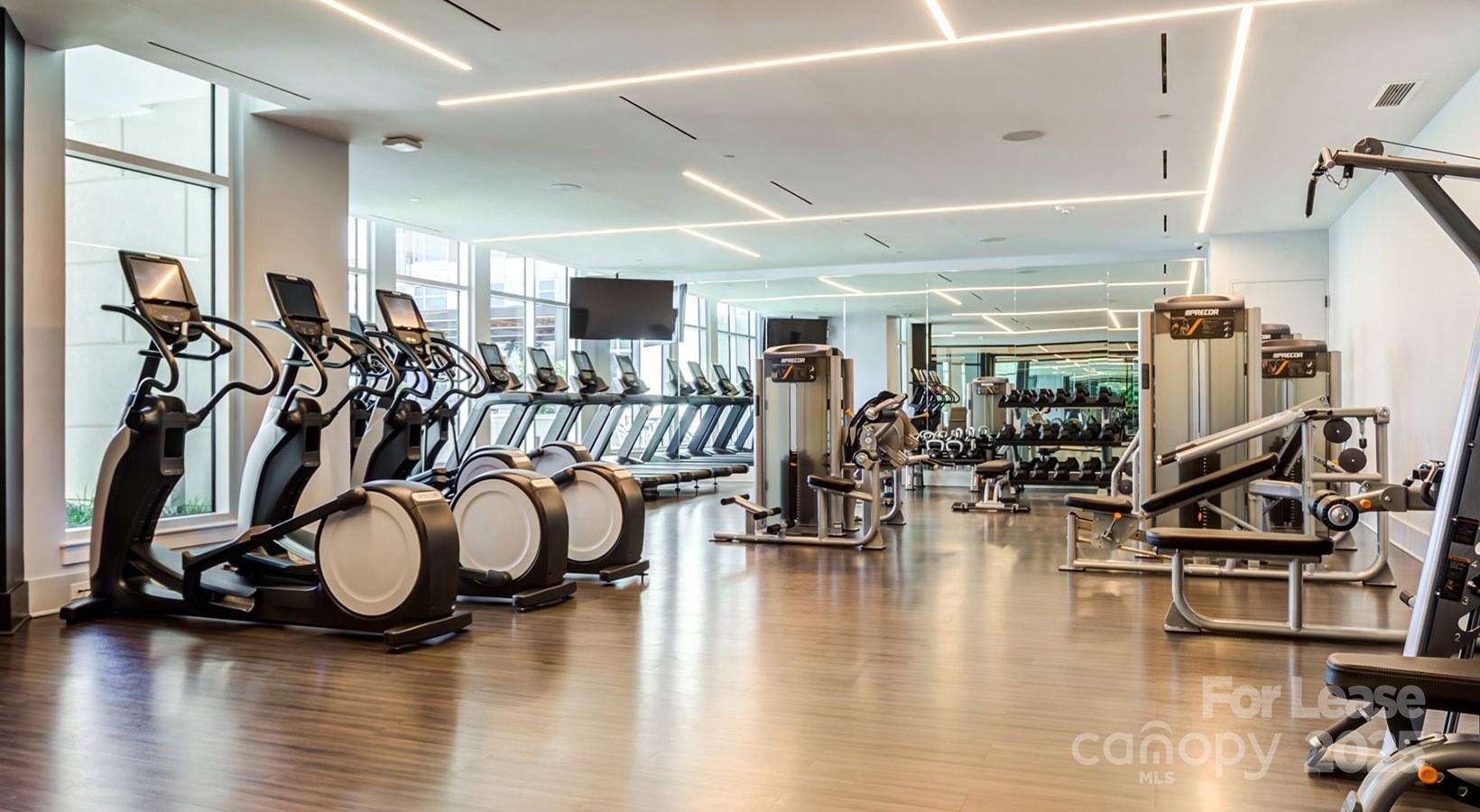 4425 Sharon Road, Unit 2F Charlotte, NC 28211 - Photo 13 of 44 a view of a room with gym equipment