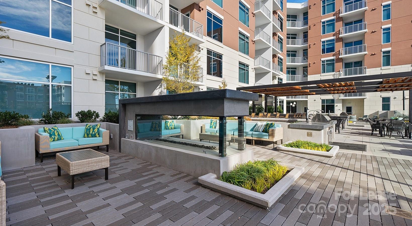 4425 Sharon Road, Unit 2F Charlotte, NC 28211 - Photo 18 of 44 a view of a building with sitting area