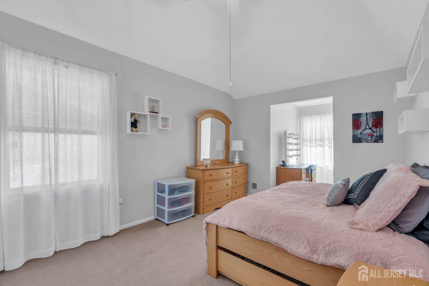 14 Daniel Place Old Bridge, NJ 07747 - Photo 21 of 38 a bedroom with a large bed and dresser