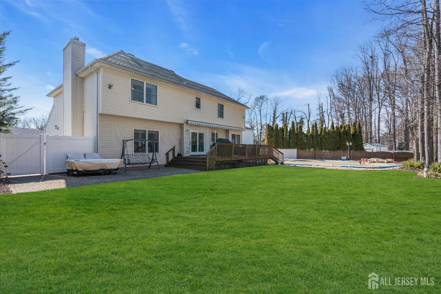 14 Daniel Place Old Bridge, NJ 07747 - Photo 27 of 38 a front view of house with yard and outdoor seating