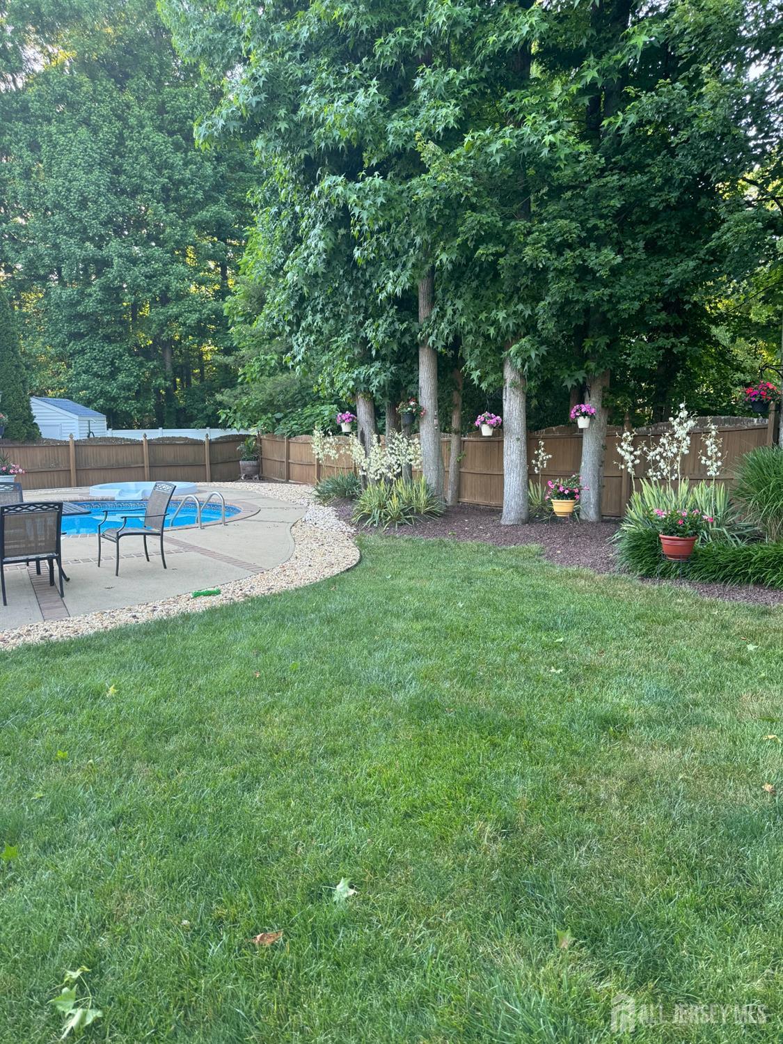 14 Daniel Place Old Bridge, NJ 07747 - Photo 33 of 38 a view of a house with a backyard and a patio