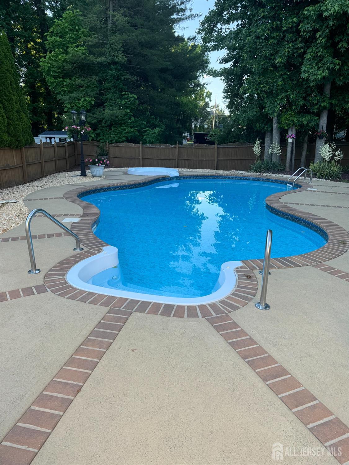 14 Daniel Place Old Bridge, NJ 07747 - Photo 36 of 38 a view of a swimming pool with a yard