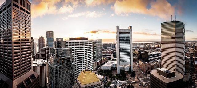 a view of a city with tall buildings