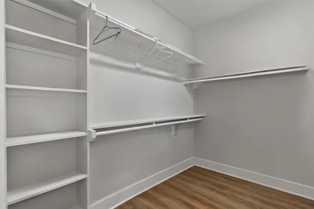 a view of an empty walk in closet