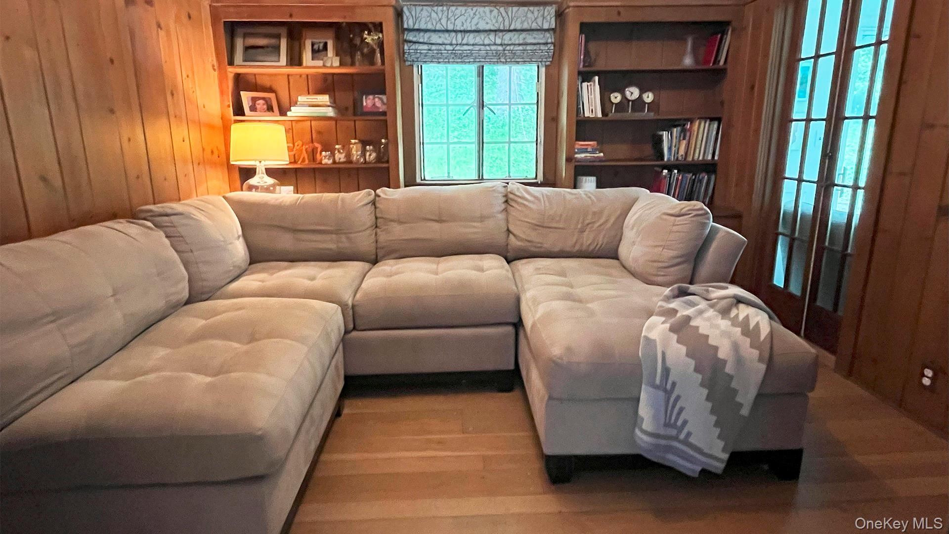 8 Holly Lane Rye, NY 10580 - Photo 16 of 27 Cosy paneled TV room with hardwood floors
