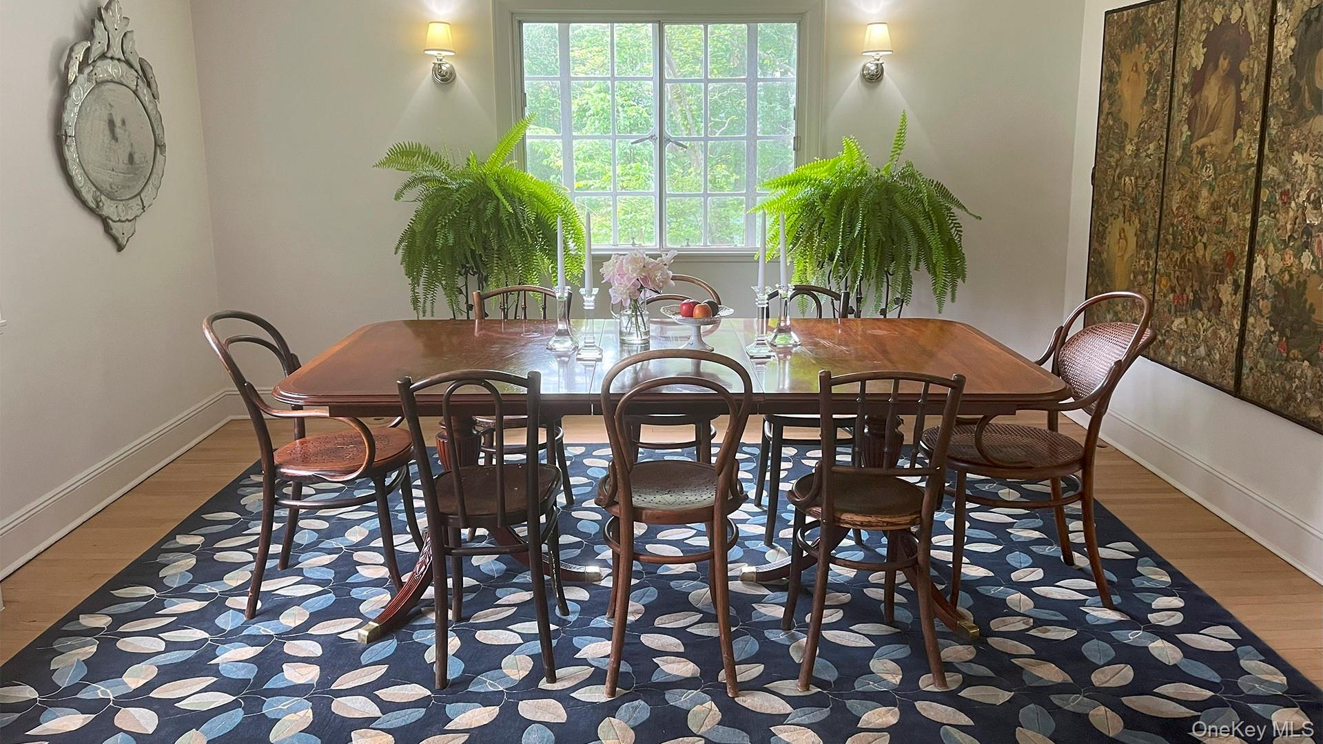 8 Holly Lane Rye, NY 10580 - Photo 7 of 27 Dining room with ample natural light and gleaming hardwood floors