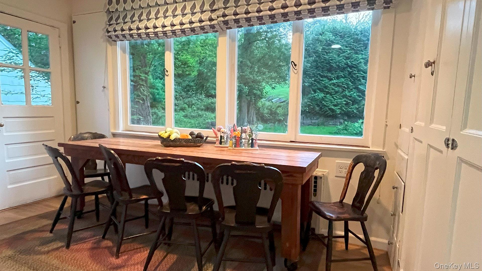 8 Holly Lane Rye, NY 10580 - Photo 10 of 27 Eat in kitchen with lovely views over the garden