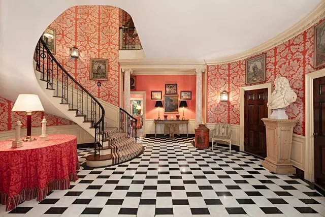 a black and white photo of a living room