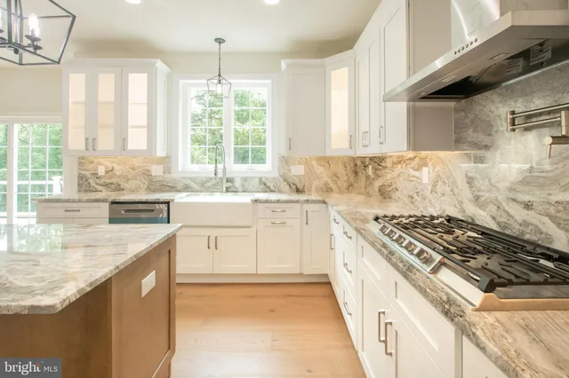 a large kitchen with cabinets