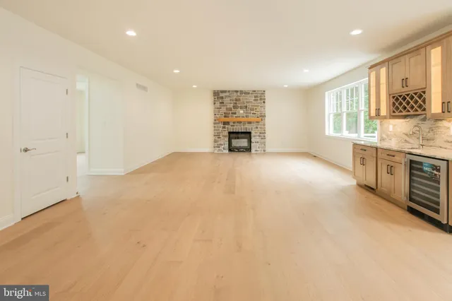 a kitchen with granite countertop a sink and a window