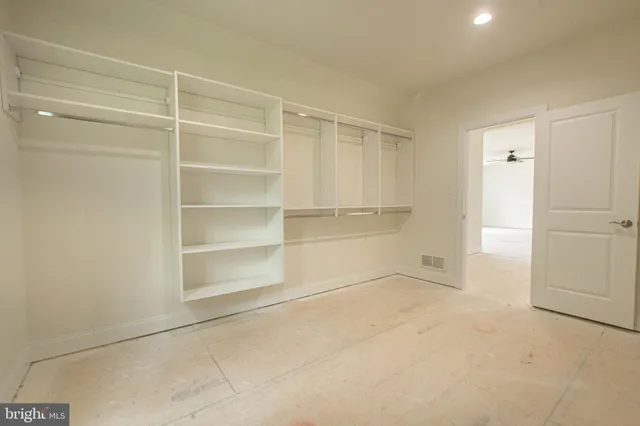 a bathroom with a sink double vanity and a mirror