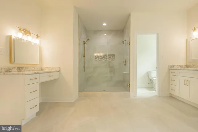 a bathroom with a bathtub and a sink