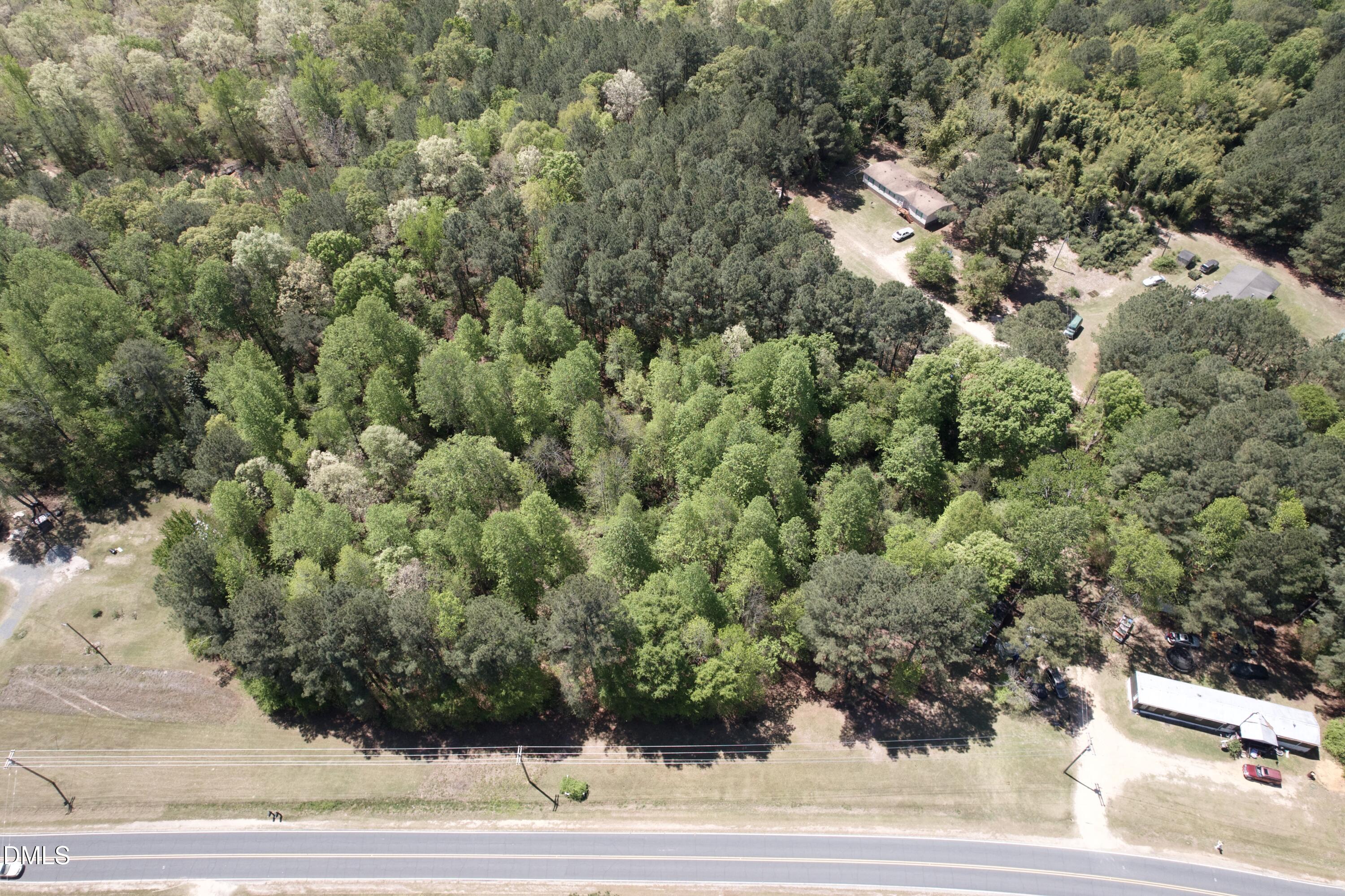Na Joel Johnson Road Lillington, NC 27546 - Photo 1 of 15 an aerial view of a house with yard
