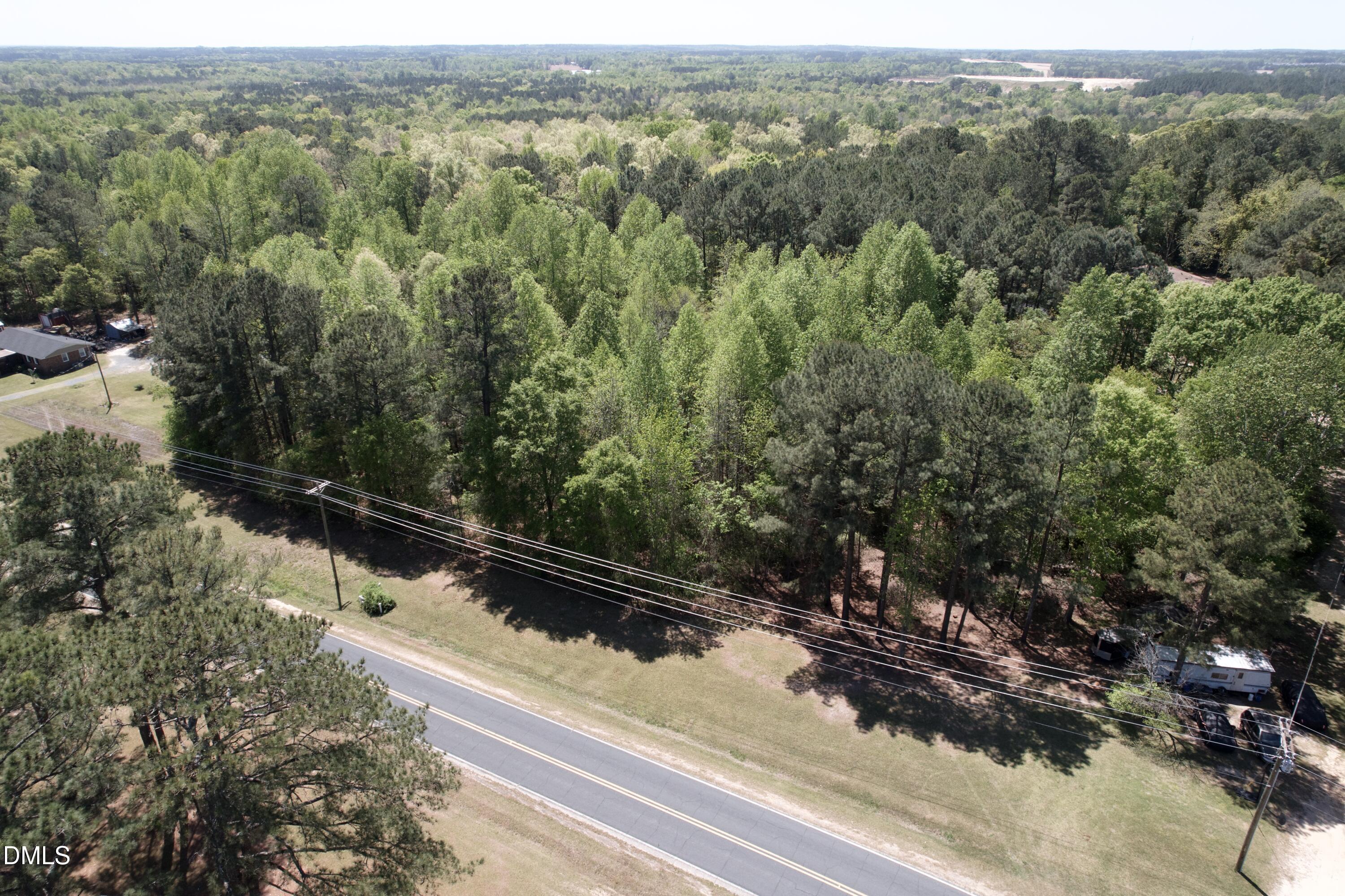 Na Joel Johnson Road Lillington, NC 27546 - Photo 11 of 15 an aerial view of residential house with green space