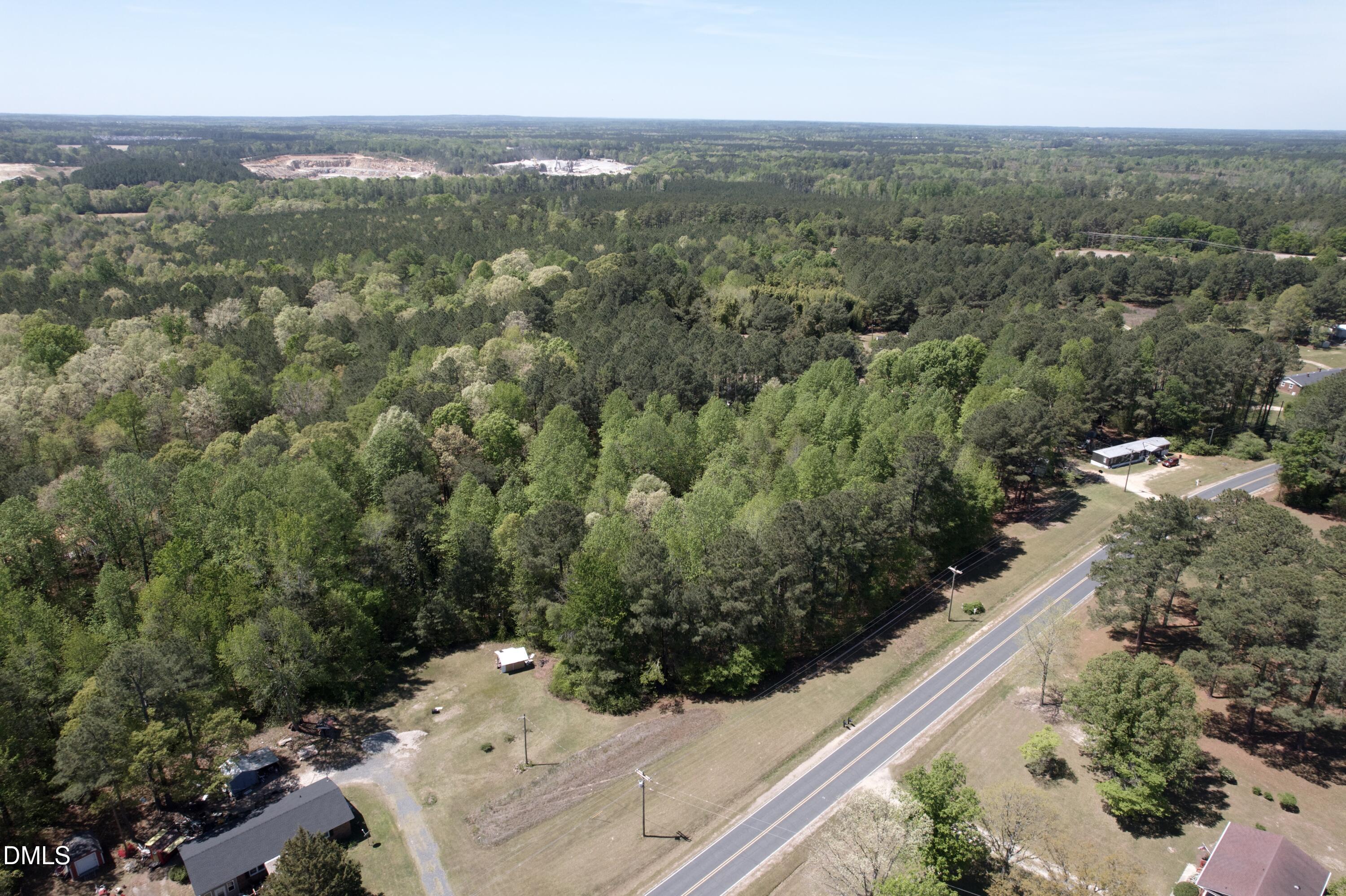 Na Joel Johnson Road Lillington, NC 27546 - Photo 15 of 15 an aerial view of a house with a yard