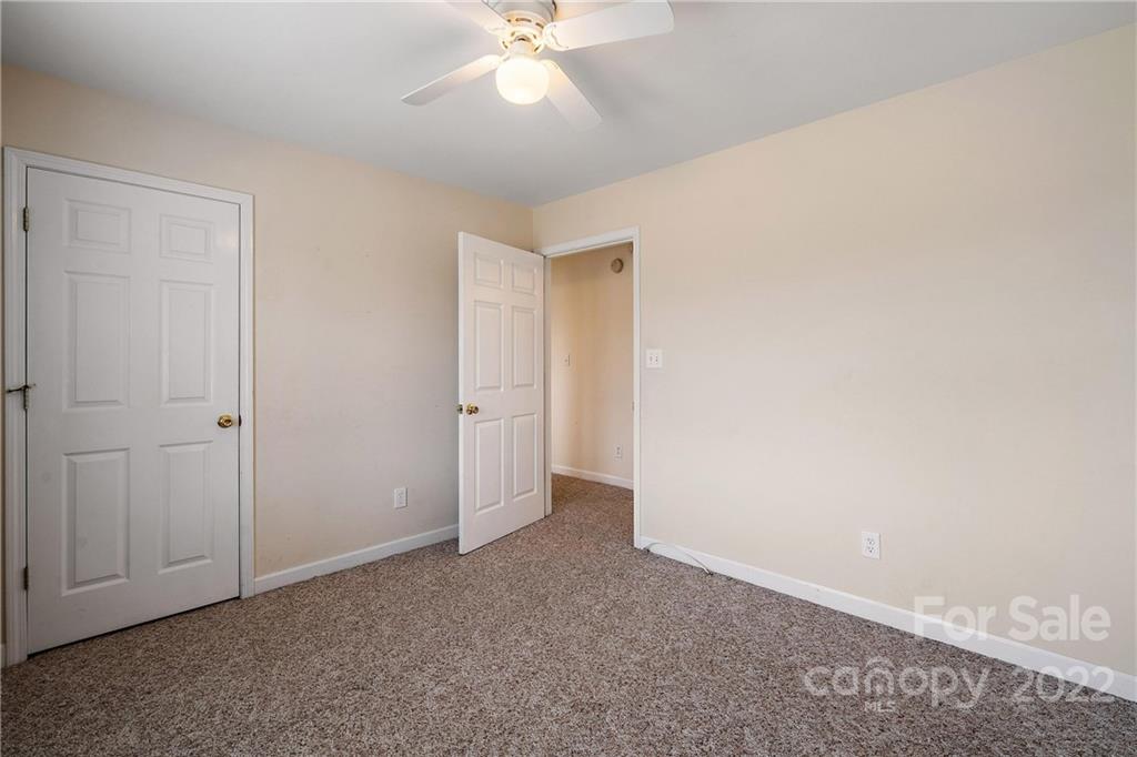 585 Windy Hill Road York, SC 29745 - Photo 23 of 38 an empty room with a ceiling fan