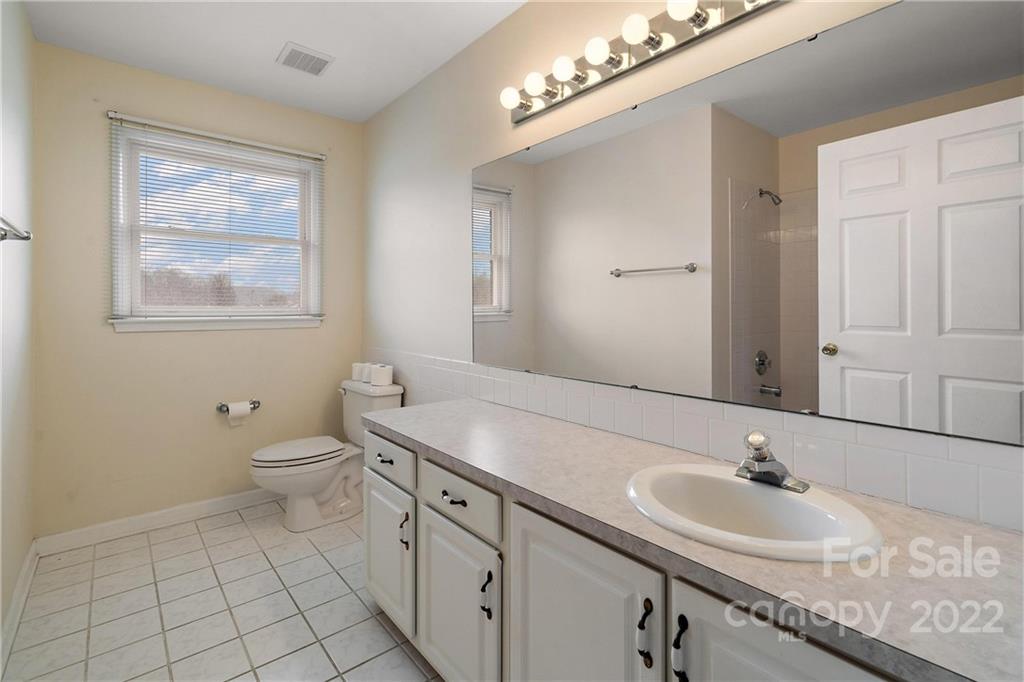 585 Windy Hill Road York, SC 29745 - Photo 24 of 38 a bathroom with a sink and a toilet