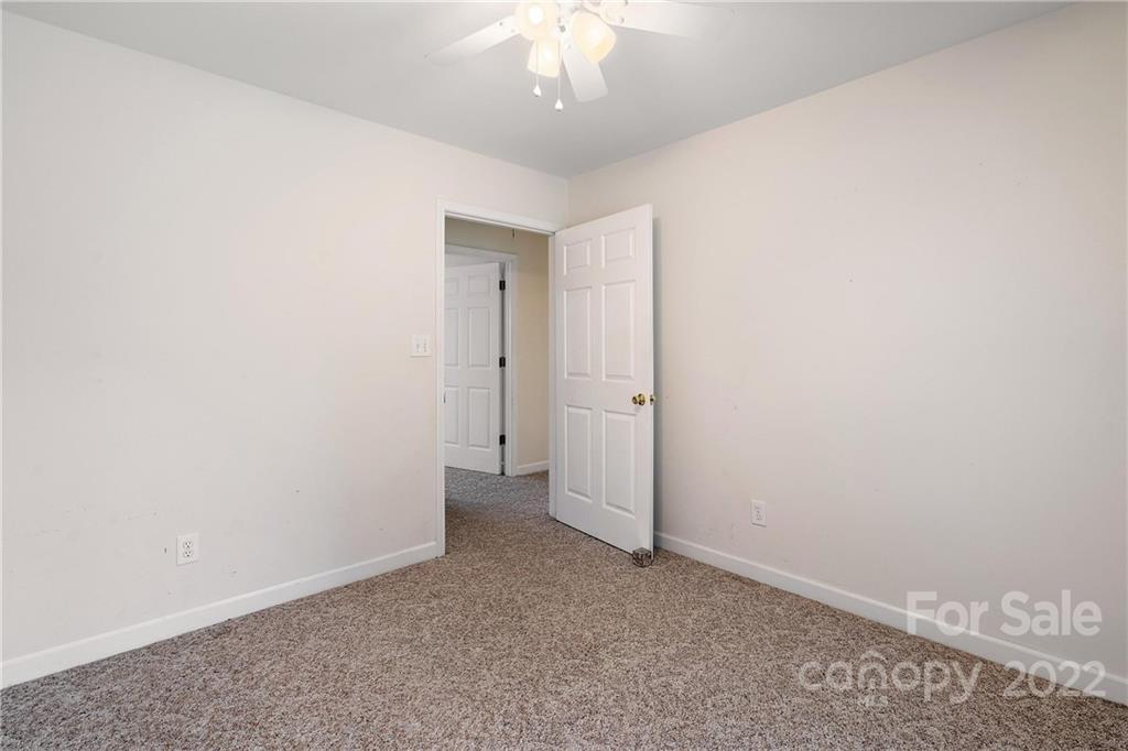 585 Windy Hill Road York, SC 29745 - Photo 29 of 38 an empty room with a bathroom