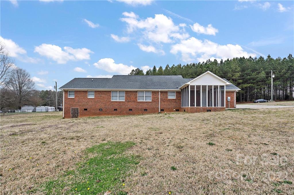 585 Windy Hill Road York, SC 29745 - Photo 34 of 38 a view of a house with a yard