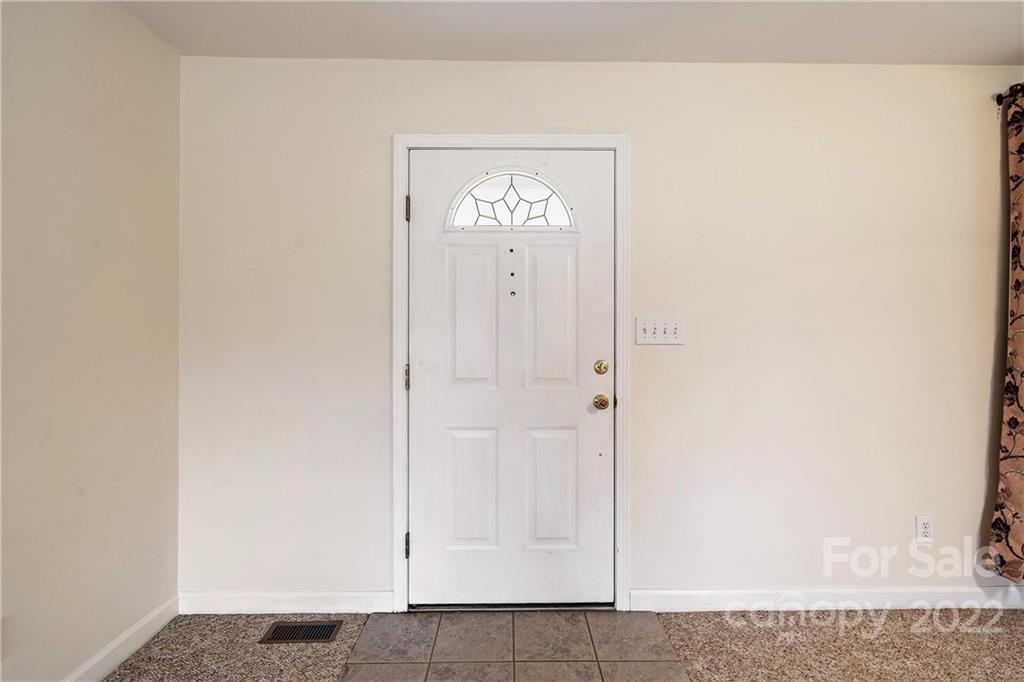 585 Windy Hill Road York, SC 29745 - Photo 8 of 38 a view of an entryway with wall