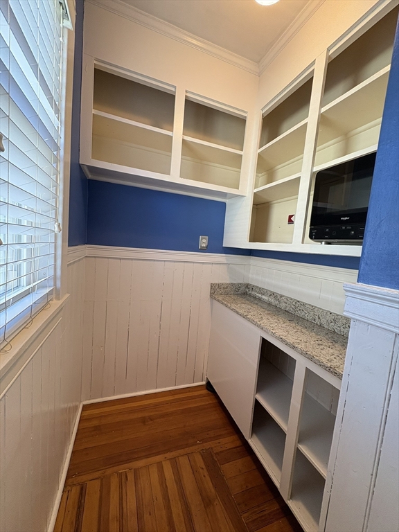 62 Ibbetson Street, Unit 3L Somerville, MA 02143 - Photo 14 of 20 a view of walk in closet with empty racks