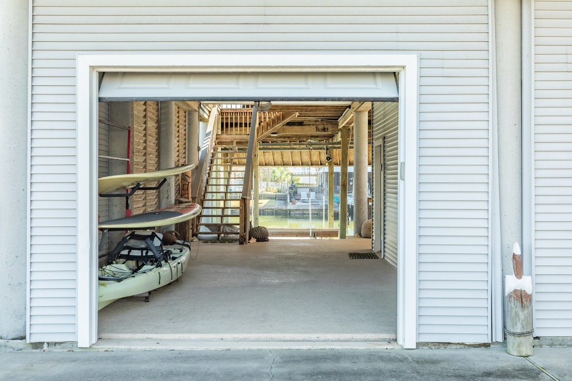 1319 Coral Way Tiki Island, TX 77554 - Photo 27 of 45 a view of an entryway with a window