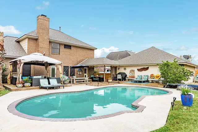 a front view of a house with patio