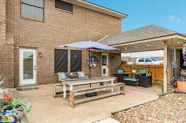 a view of an outdoor sitting area with a couch