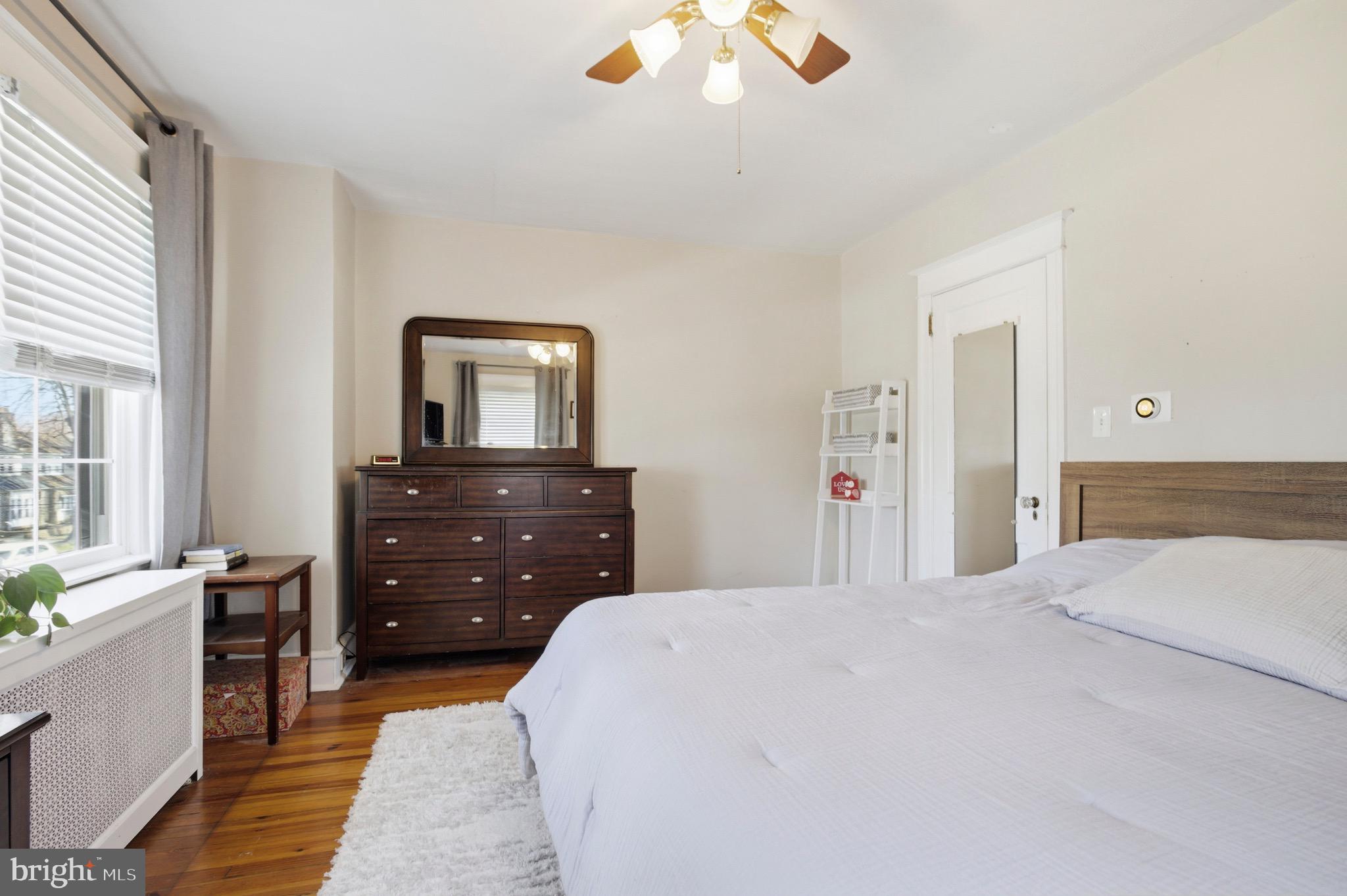 277 Ballymore Road Springfield, PA 19064 - Photo 16 of 34 a bedroom with a bed and a dresser