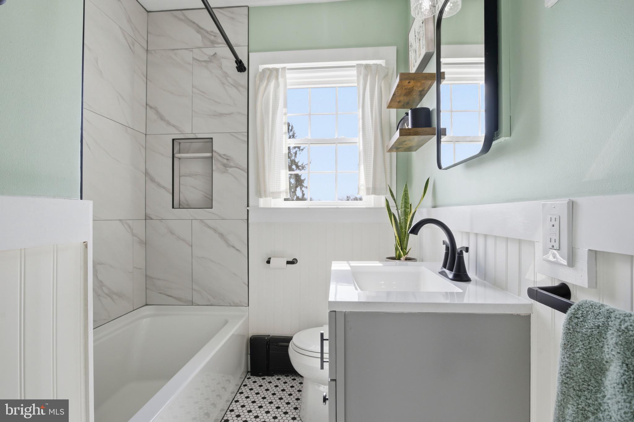 277 Ballymore Road Springfield, PA 19064 - Photo 20 of 34 a bathroom with a sink a toilet and shower